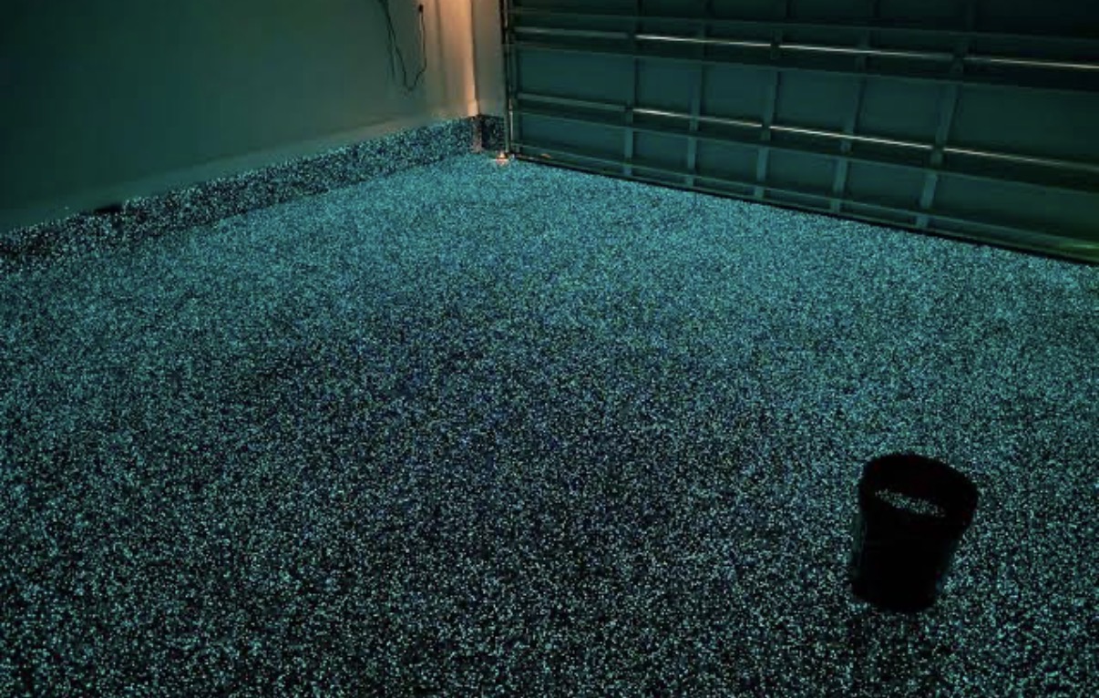 Teal glow epoxy garage floor
